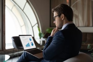 Side,Back,View,Focused,Skilled,Young,30s,Male,Marketing,Specialist